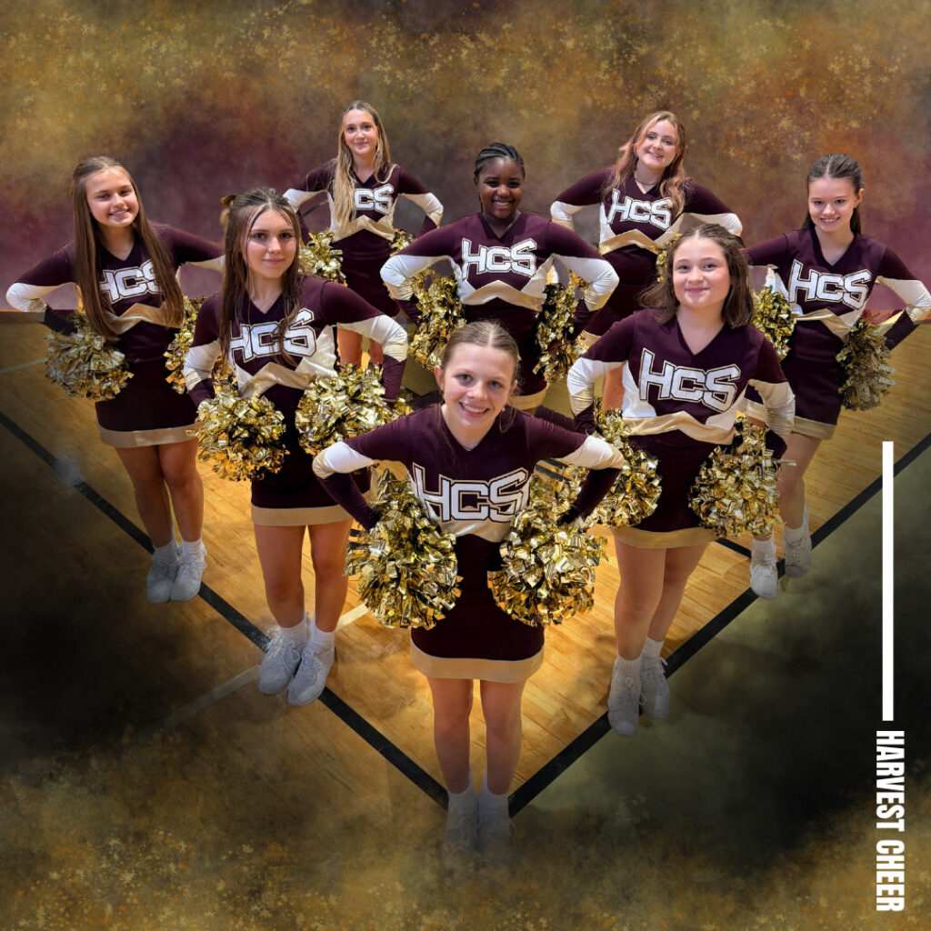 Cheerleaders from Harvest Community School pose with pom-poms in gymnasium.
