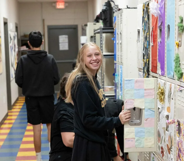 Smiling girl at harvest community school.