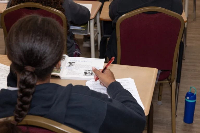 Young girl at HCS elementary doing an assignment.