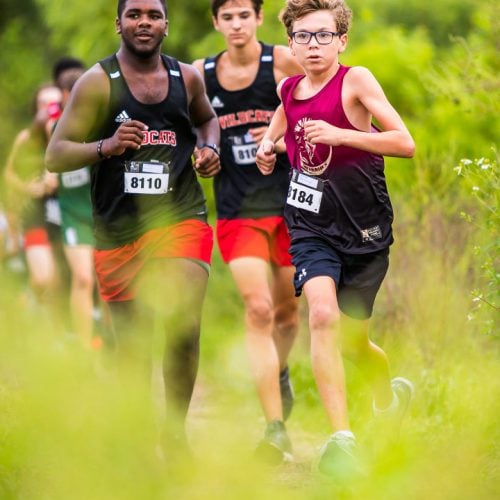 HCS student running ahead of his competition.