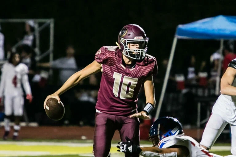 Quarterback running with the ball.