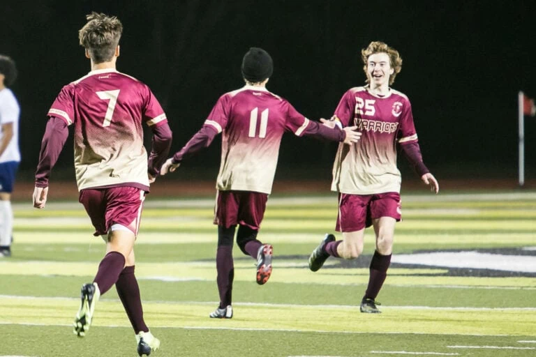 Soccer teammates excited.